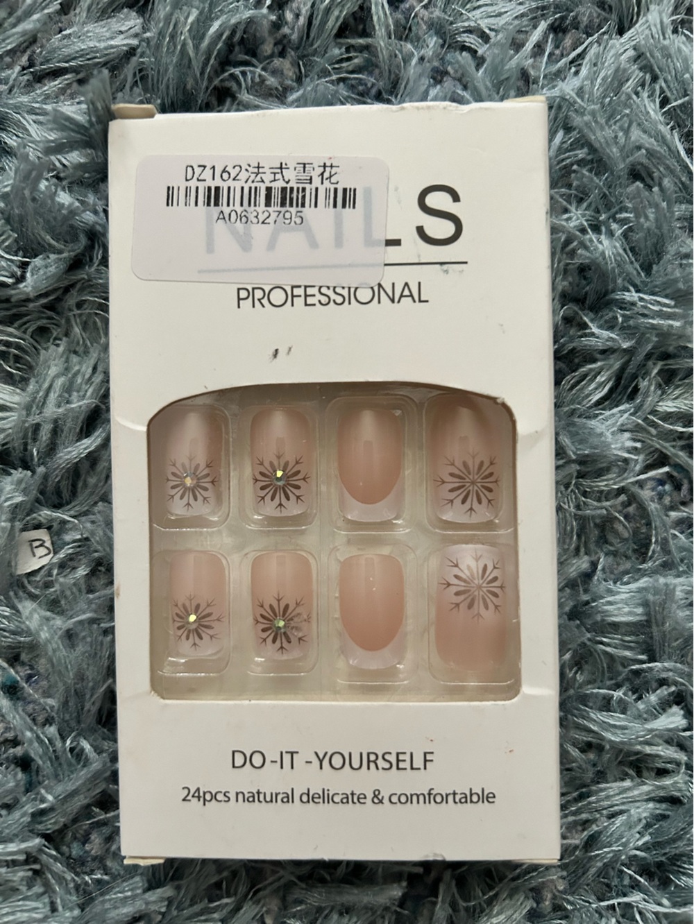 Professional Press-On Nails - Nude Floral Design with Crystal accents.